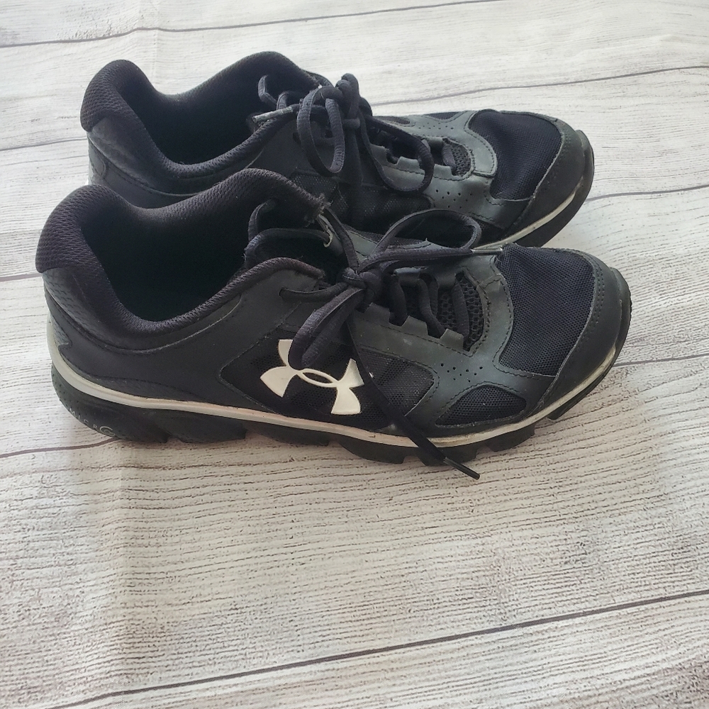 Under Armour sneakers.  Size 6.5 youth. Black and sliver